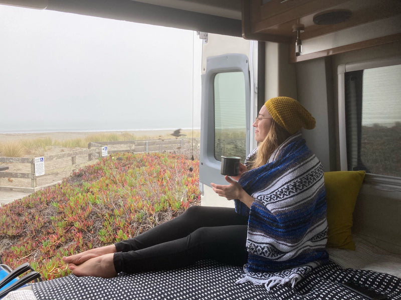  and front seats. Ideal for road trips.|This RV rental's rear doors are open — photo 8