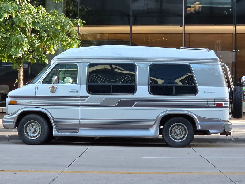  backed by stunning fall aspen trees & snow-capped mountains. Perfect rv rental for scenic drives.|Vintage two-tone gray conversion van — photo 2