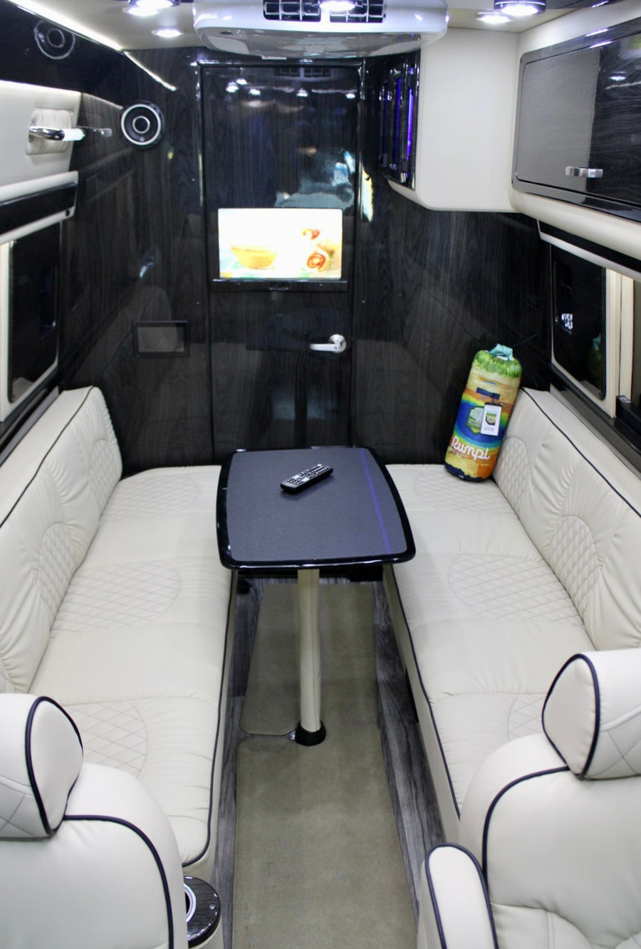  controlling interior and awning lights for a comfortable journey.|Inside an RV rental: control panel for lights