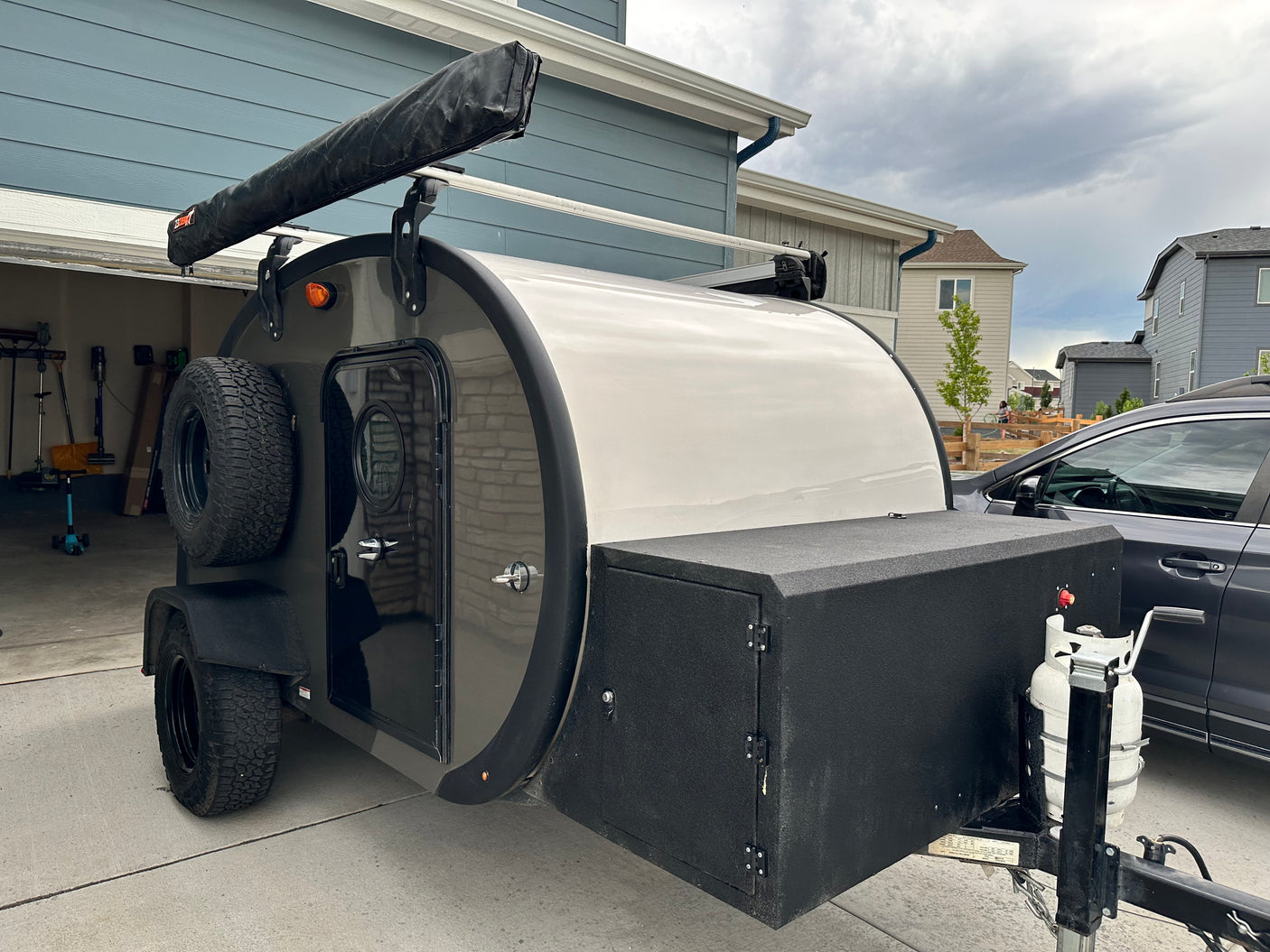 This rugged teardrop camper, ready with an awning and propane, could be your next RV rental for outdoor adventure.