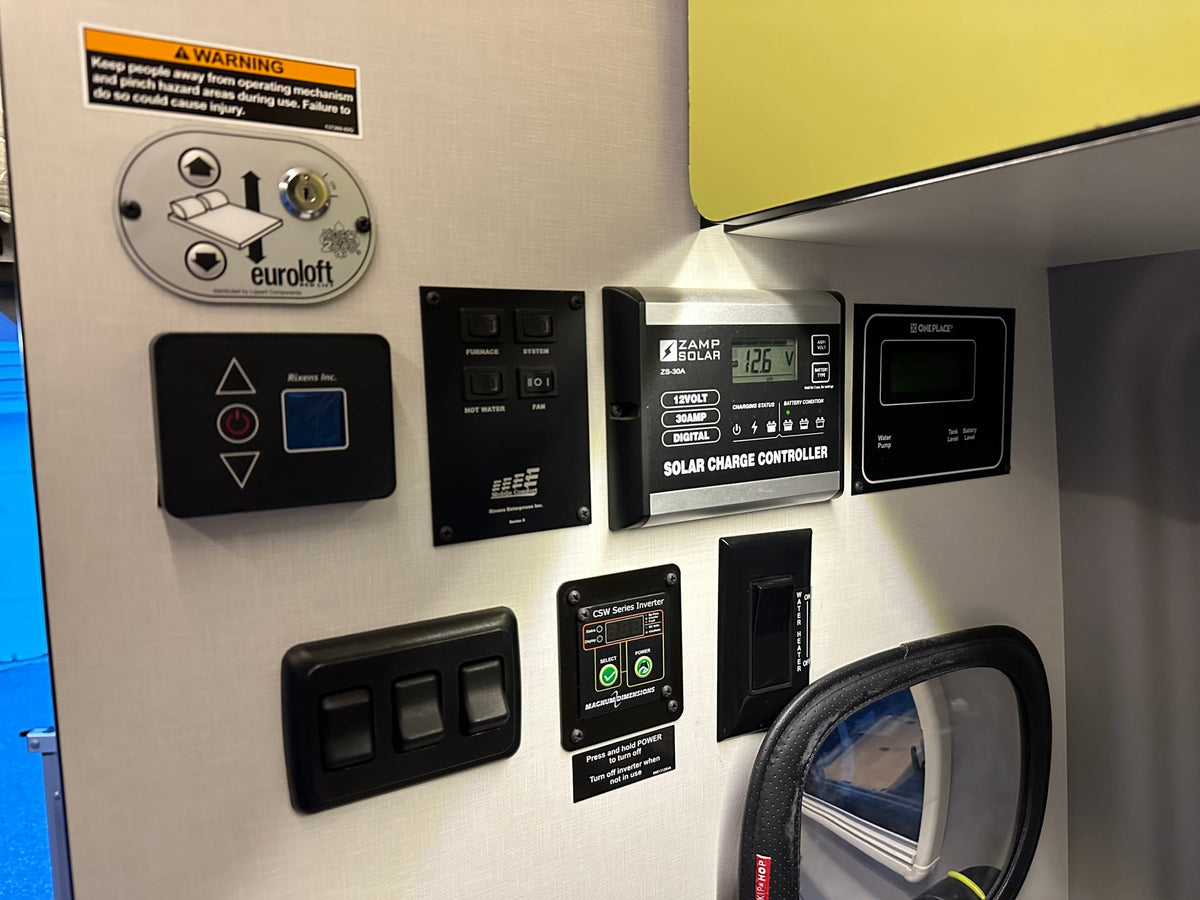  and ambient lighting.|RV rental interior: A compact camper van featuring a bed — photo 15