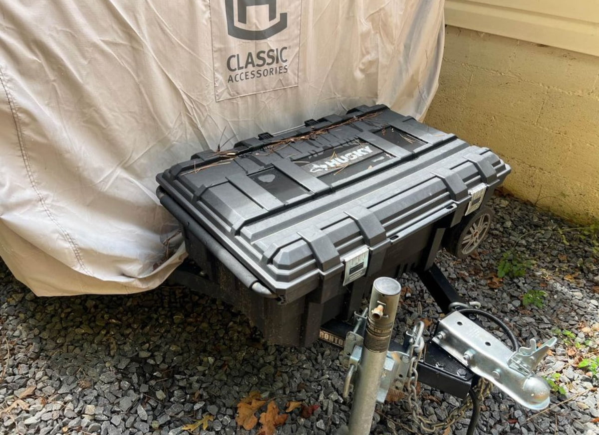 Durable Husky toolbox mounted on a covered RV trailer, providing secure storage for RV rental gear. — photo 6
