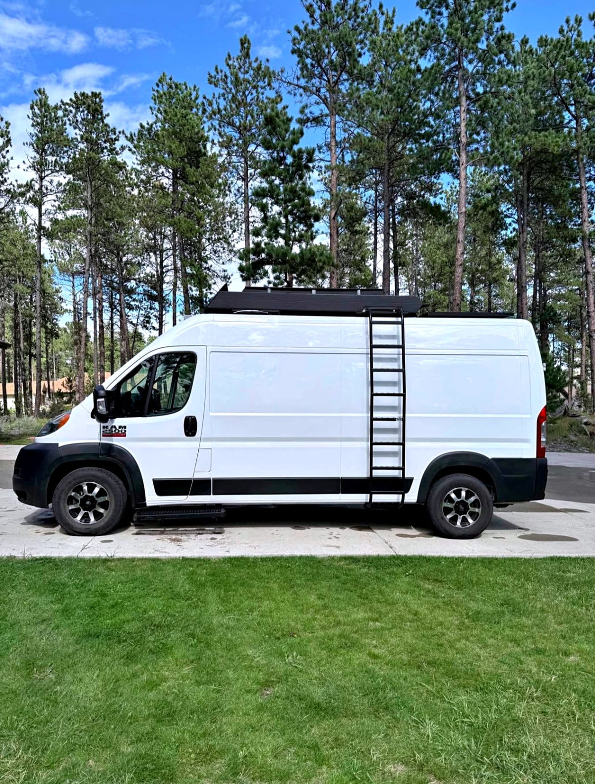 Explore with this white Ram ProMaster camper van rv rental