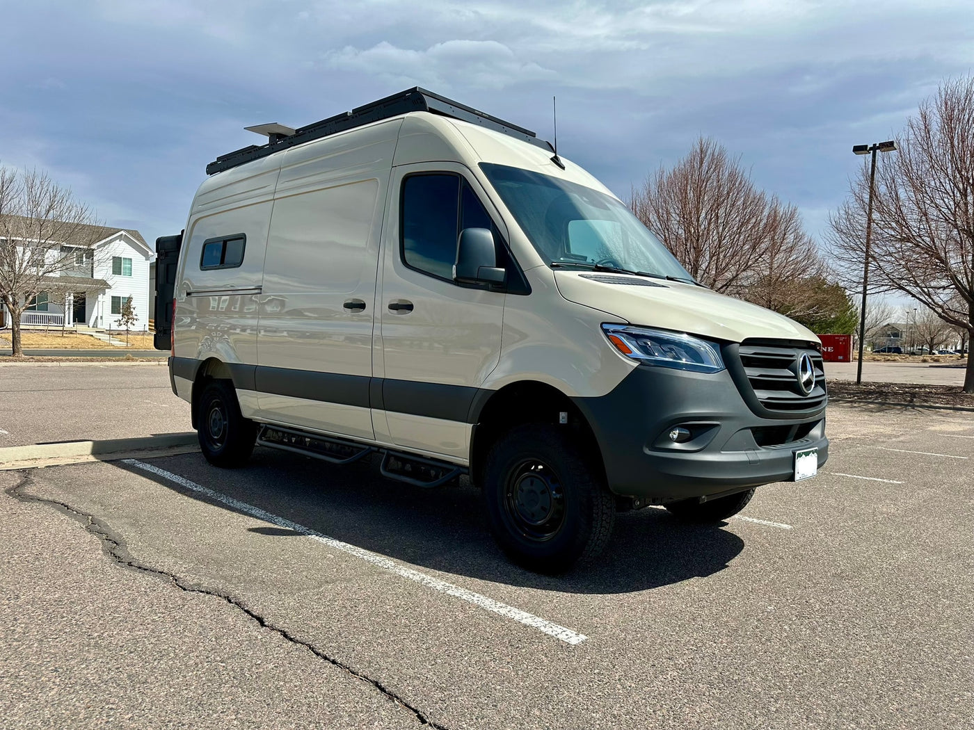  light-colored Mercedes Sprinter camper van for rv rental — photo 2