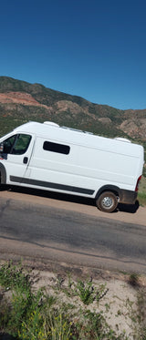 By Denver International Airport, a heated cabin on wheels