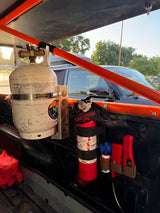 Organized for RV rental adventures: A mounted CO2 Powertank, fire extinguisher, and emergency signaling tools inside a vehicle.