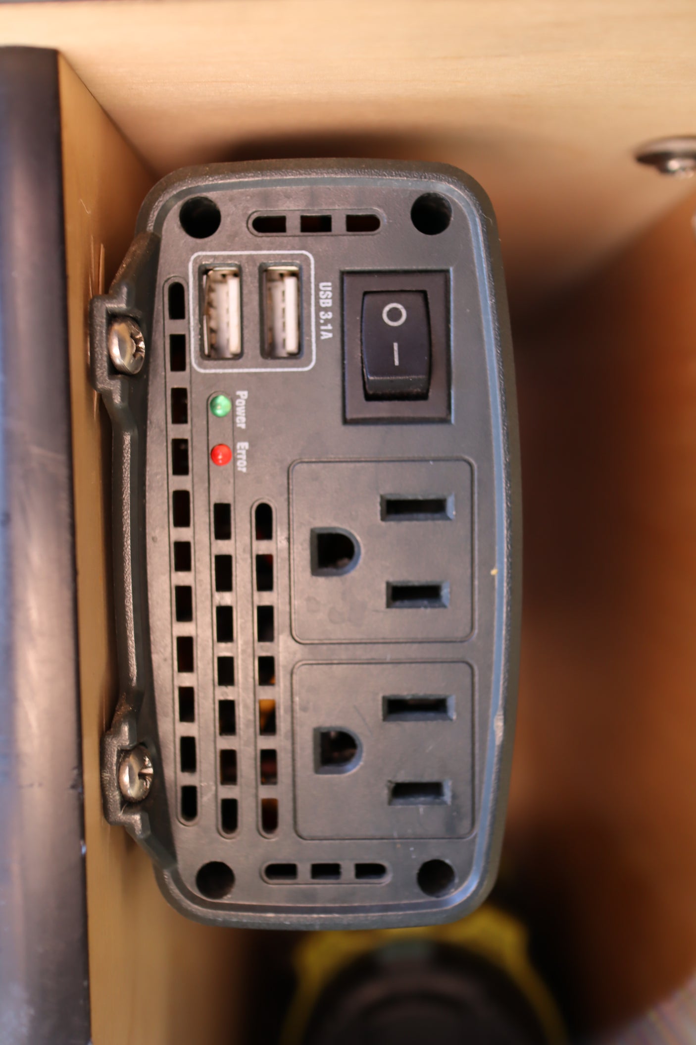 RV rental power inverter with two AC outlets, dual USB 3.1A ports, power switch, and indicator lights for mobile power.
