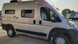 Rent this modern grey camper van, a perfect RV rental for your next road trip adventure. Features side windows and AC.