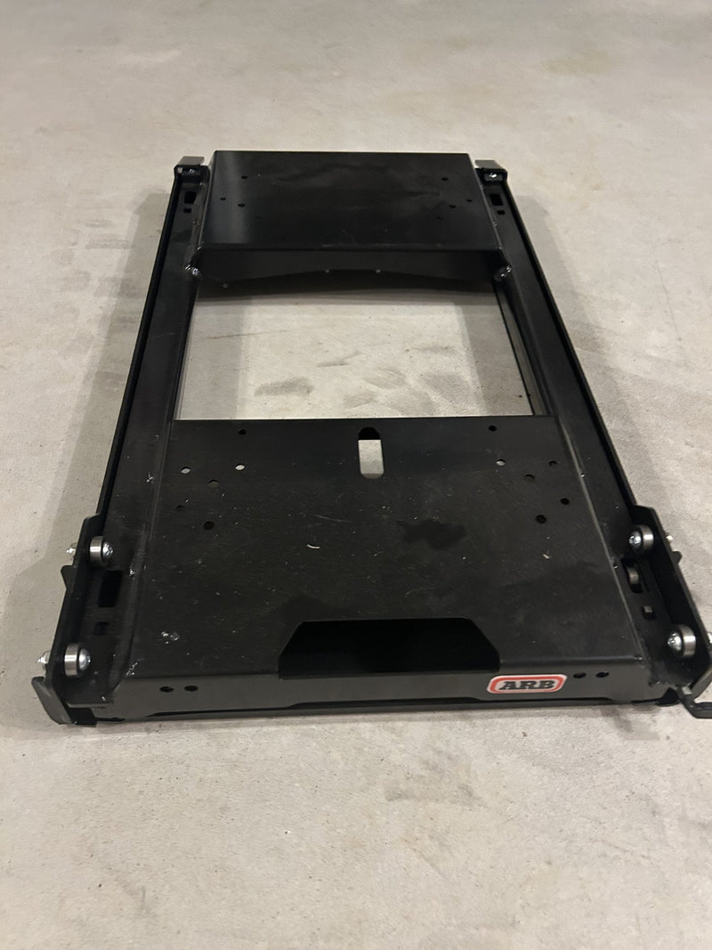 ARB Zero fridge slide at an angle, showing the ARB badge, side rails and tie-down slots — photo 2