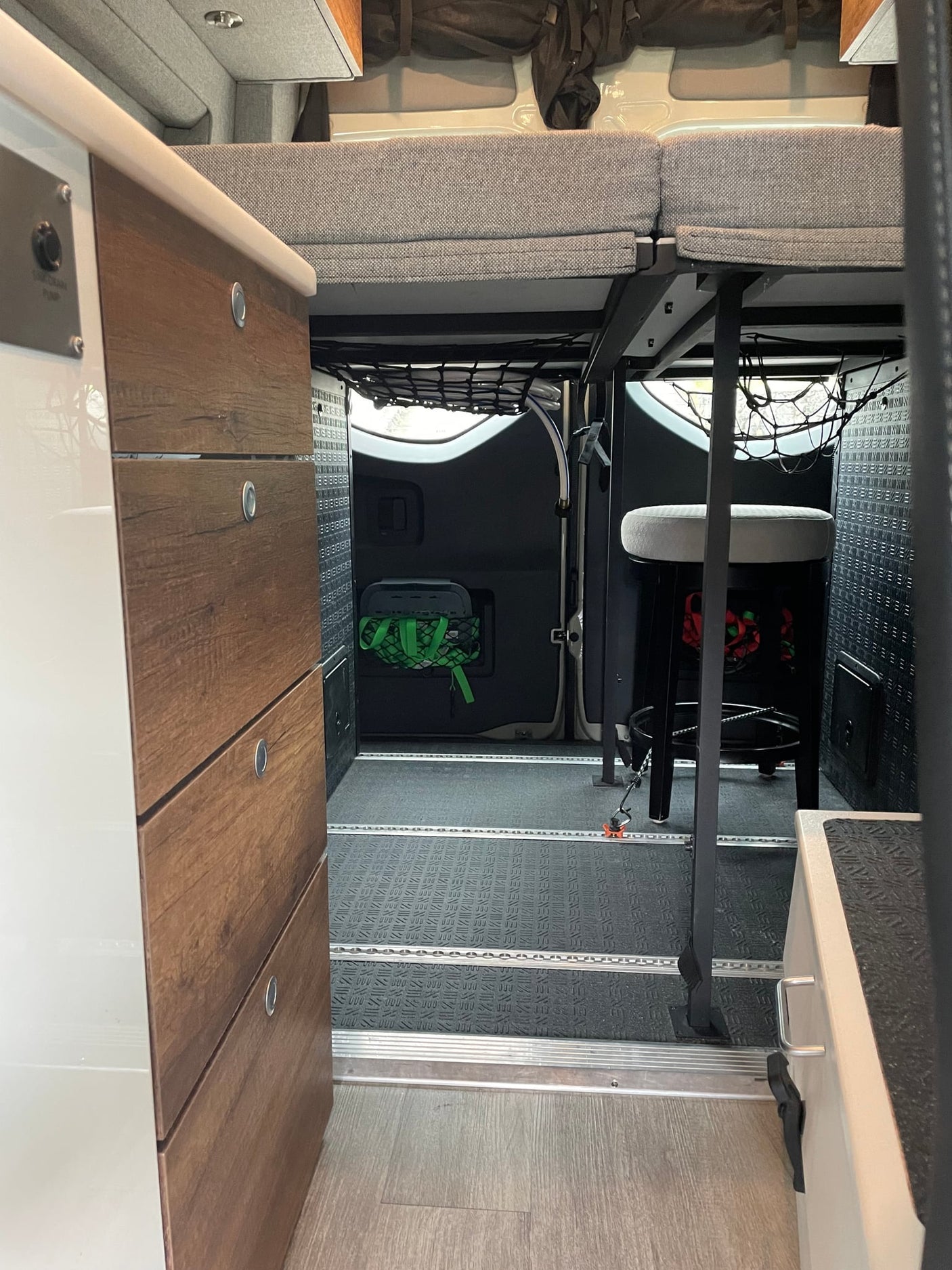  and ceiling AC.|Interior view of an rv rental camper van