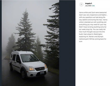 White Ford camper van RV rental on a misty forest road, perfect for exploring Washington's parks.