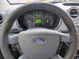Interior view of a Ford car dashboard with steering wheel, instruments, and 048444 odometer. Great for an RV rental trip.
