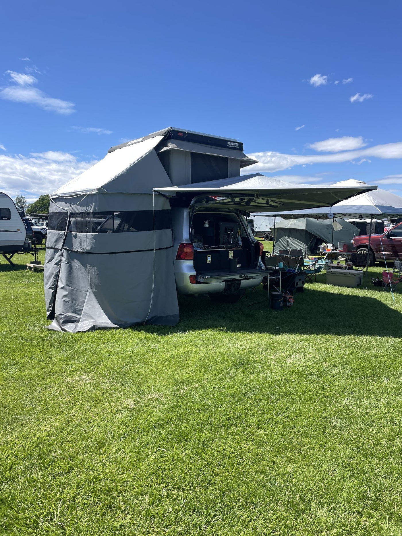 Bundutop rooftop tent deployed with 270-degree awning and annex, full kit set up — photo 2