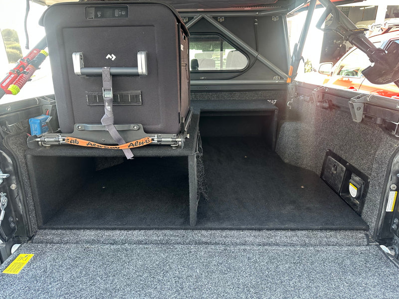 Custom truck bed storage with Dometic fridge on slider and gear mounts, ideal for any rv rental adventure. — photo 13