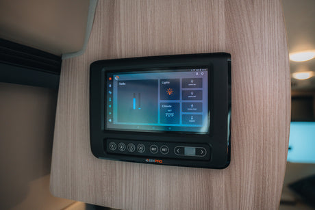 RV rental's BMPRO digital control panel shows tank levels, climate, and lighting. A modern smart system for convenience.