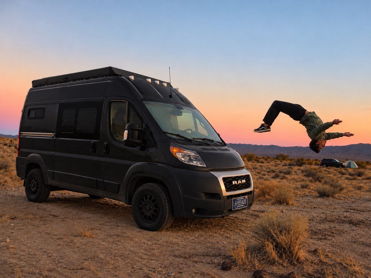 Adventure awaits! This RV rental camper van at sunset shows a person backflipping in a desert landscape.|Cozy RV rental interior featuring a comfortable bed