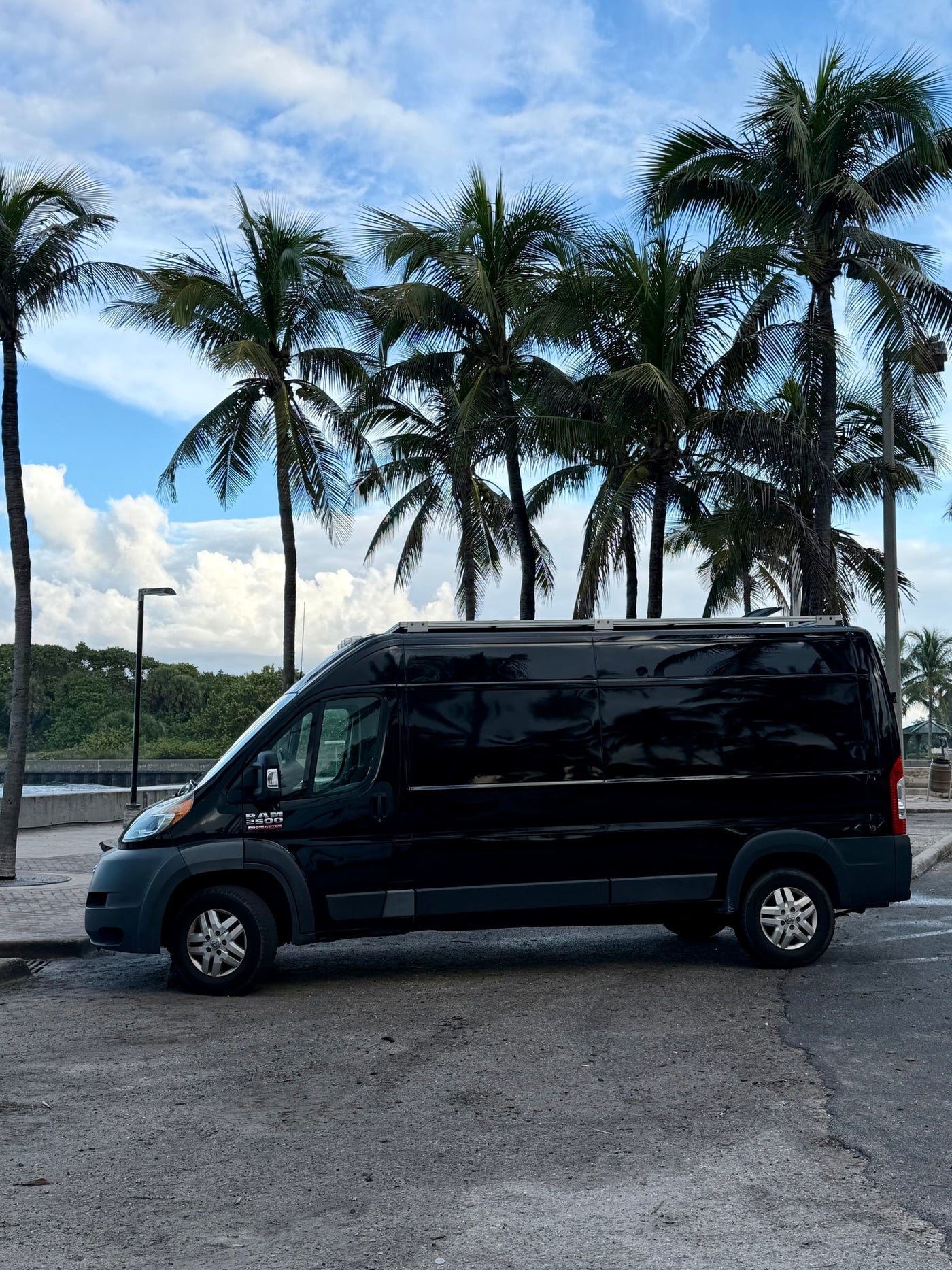 ready for a beach adventure.|A black Ram ProMaster van — photo 2