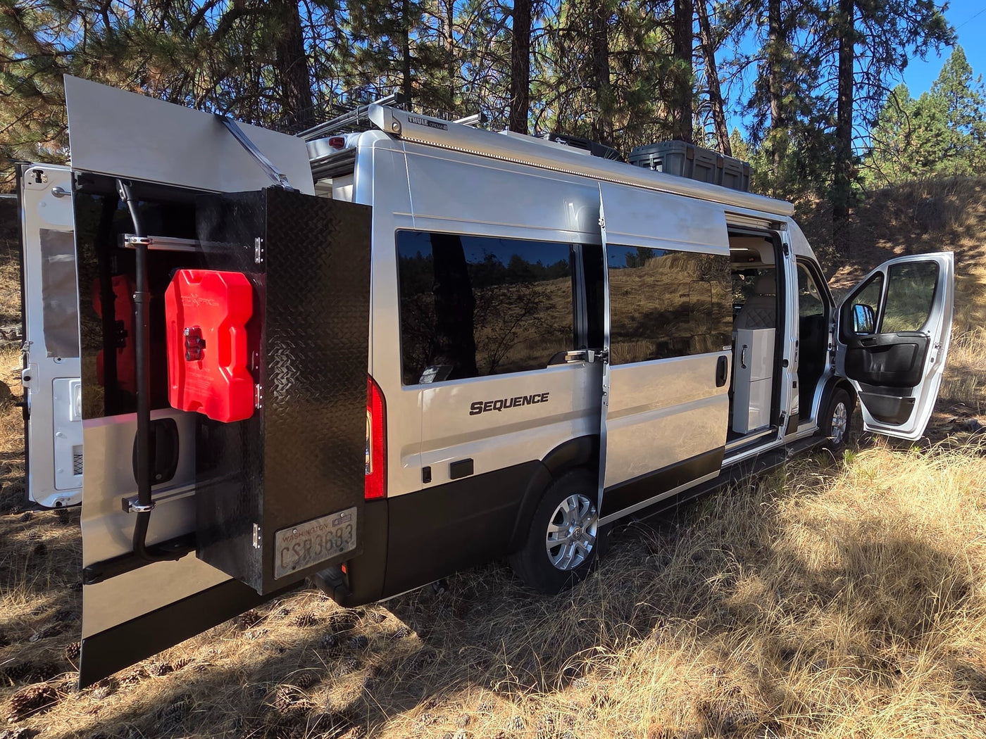  grassy landscape. Your comfy camper adventure.|Inside an rv rental: modern kitchenette with sink — photo 16