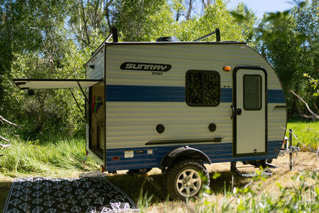 This Sunray Sport travel trailer RV rental is perfect for off-grid camping. Explore the outdoors in comfort and style.