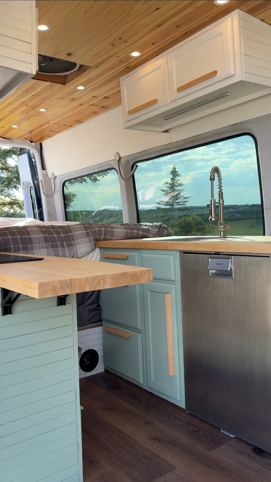  set against a scenic autumn landscape with a distant white church.|Woman with purple backpack exits her rv rental camper van in a forest