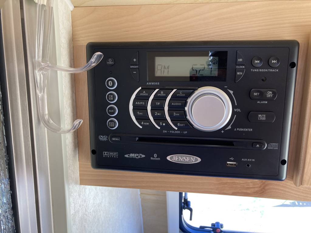 An RV rental's entertainment: A Jensen AWM968 multimedia system, featuring radio, DVD, USB, and Bluetooth audio for your journey. — photo 3
