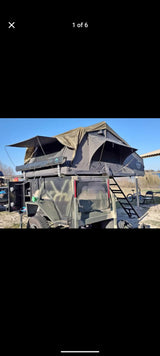 This robust overland trailer with rooftop tent and extended awning is an ideal rv rental for outdoor adventures.