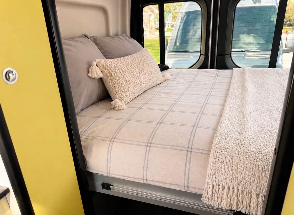  and a dog enjoying epic mountain views.|Two adventure rv rental vans — photo 2