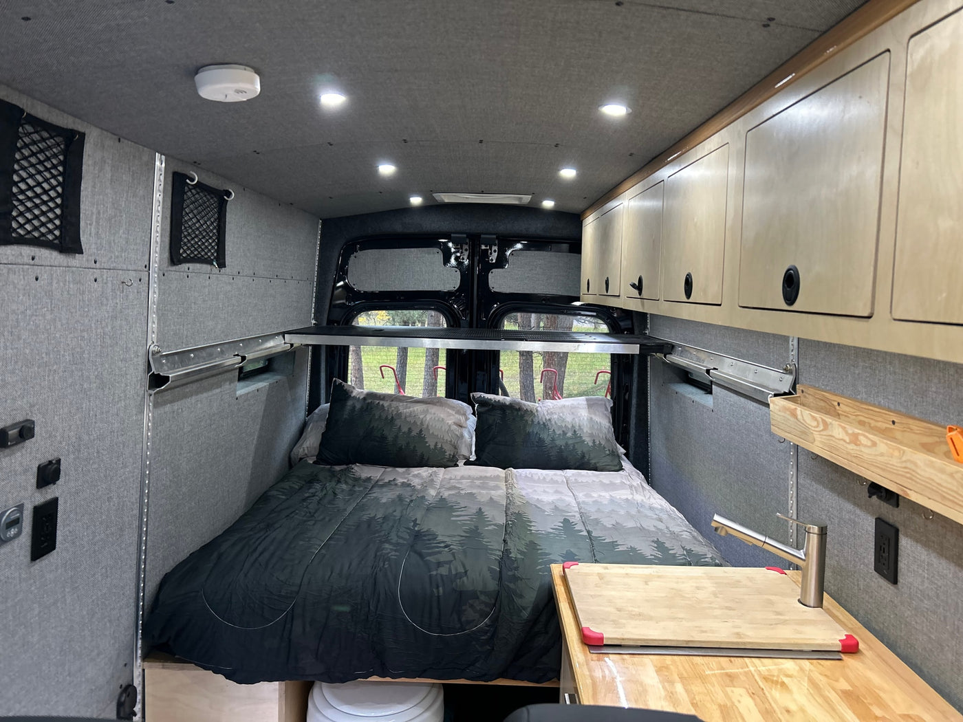  and amenities.|This RV rental kitchenette features a stainless sink — photo 19