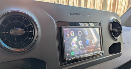Dashboard of an RV rental Sprinter van, showing a Sony infotainment system with navigation, media, and phone apps.