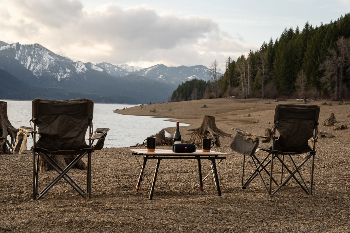  and a view of mountains. Perfect for your next adventure!|Relaxing in a cozy RV rental van with a scenic mountain view. This custom interior offers comfortable travel adventures.|Inside this custom camper van — photo 6