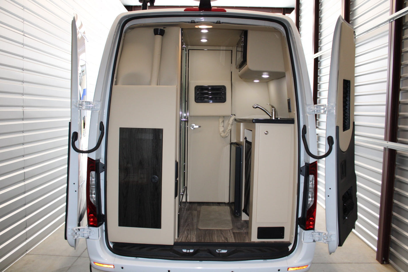  and cupholders for a comfortable journey.|This luxury rv rental features plush seating and a large entertainment system for comfortable travel — photo 3