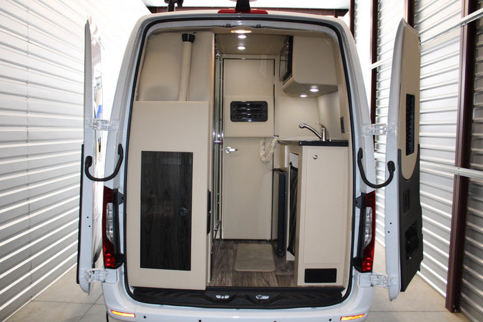  and cupholders for a comfortable journey.|This luxury rv rental features plush seating and a large entertainment system for comfortable travel