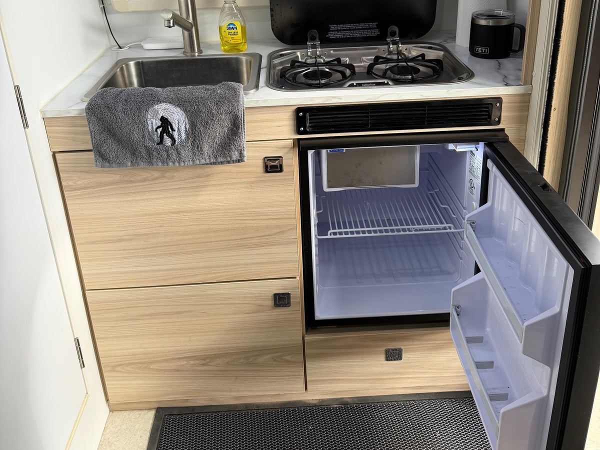 perfect for a cozy camping trip.|RV rental kitchen: sink — photo 13