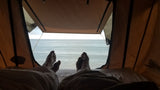 Relaxing with an ocean view from your rv rental. Enjoy beachside comfort in a rooftop tent.