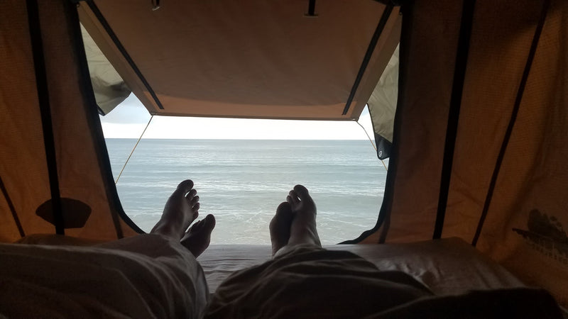 ideal for remote camping.|Relaxing with an ocean view from your rv rental. Enjoy beachside comfort in a rooftop tent.|Setup for an RV rental adventure: Coleman stove — photo 1