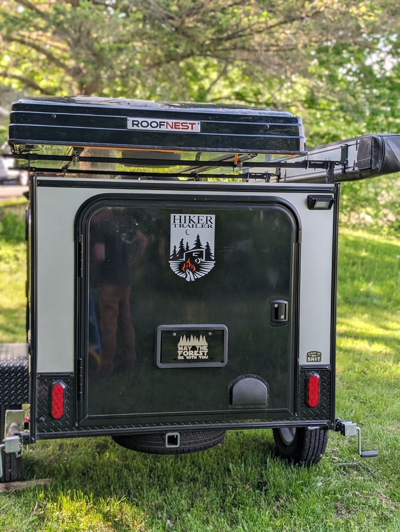  ideal for nature lovers and outdoor adventurers.|A "Clean Up Your SH*T" sticker with a tree design on an RV rental — photo 15