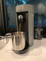 Nespresso coffee brewing into a Delonghi mug. Perfect for an RV rental adventure.