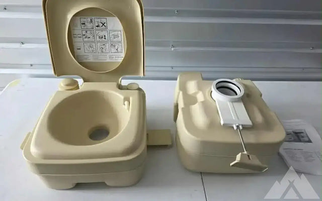 Brand New (but slightly beat up) Camping Toilet — new showers & toilets for sale