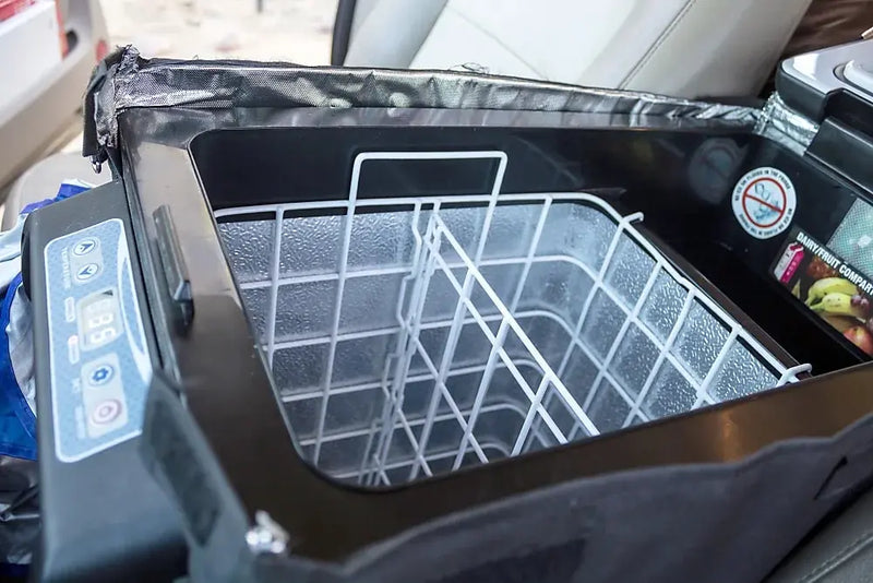 RV rental interior: A car transformed into a comfortable sleeping space with a bed — photo 9