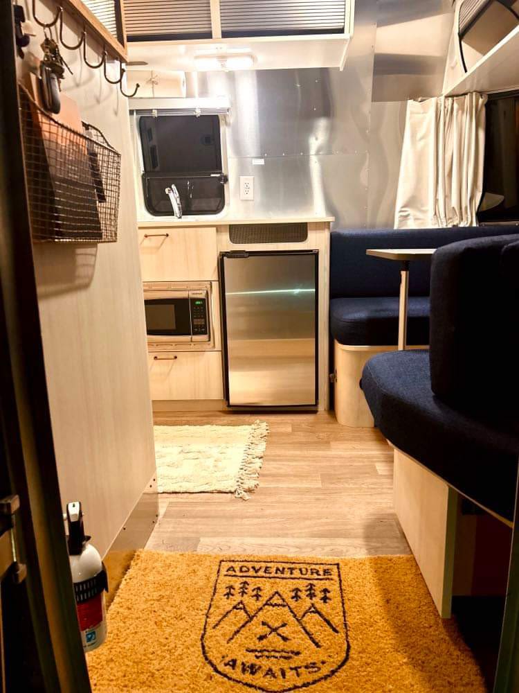  and games for fun nights on the road.|RV rental interior with books — photo 14