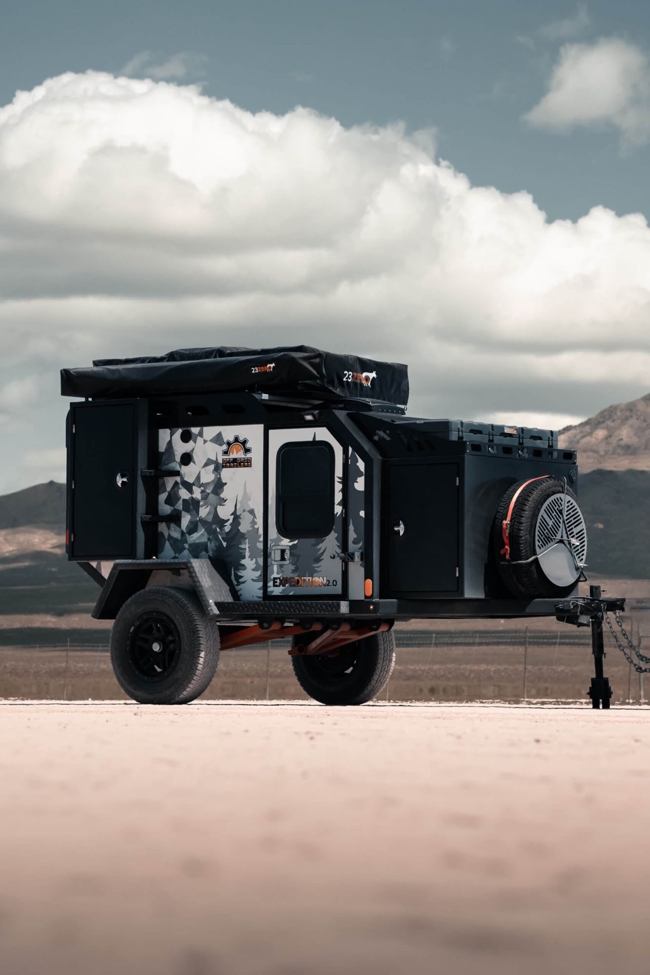  ideal for your rv rental adventure.|Truma portable fridge on a pull-out slide from an Off Grid Trailers expedition RV — photo 3
