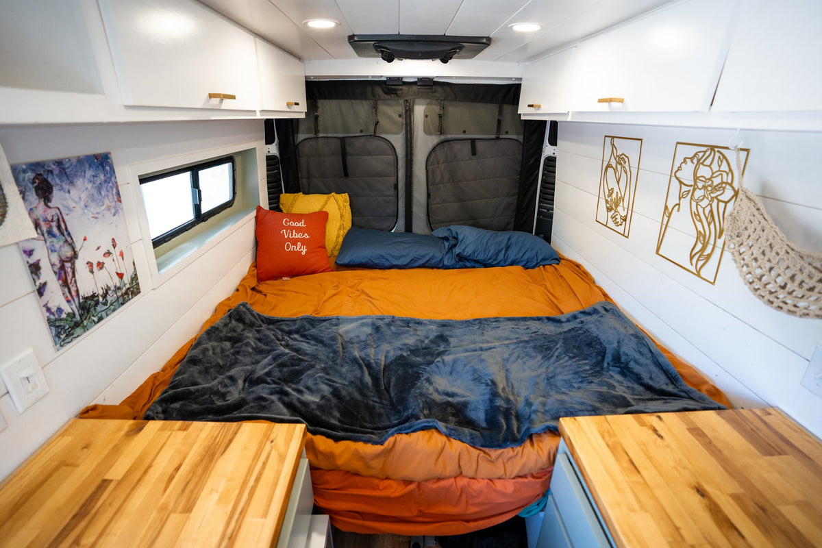  ready for vanlife adventures.|Cozy rv rental interior with a bed — photo 16