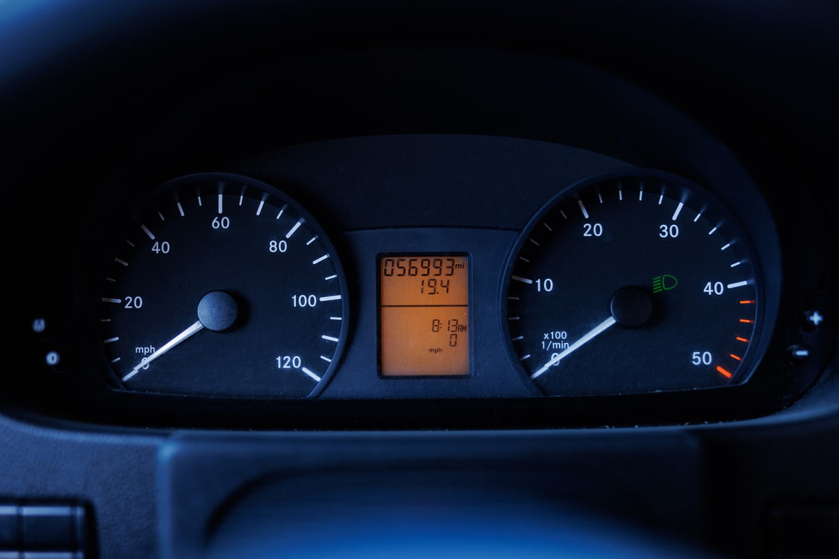 This RV rental dashboard displays 056,993 miles, 19.4 trip data, and 8:13 AM. Speed and RPM gauges read zero. — photo 12