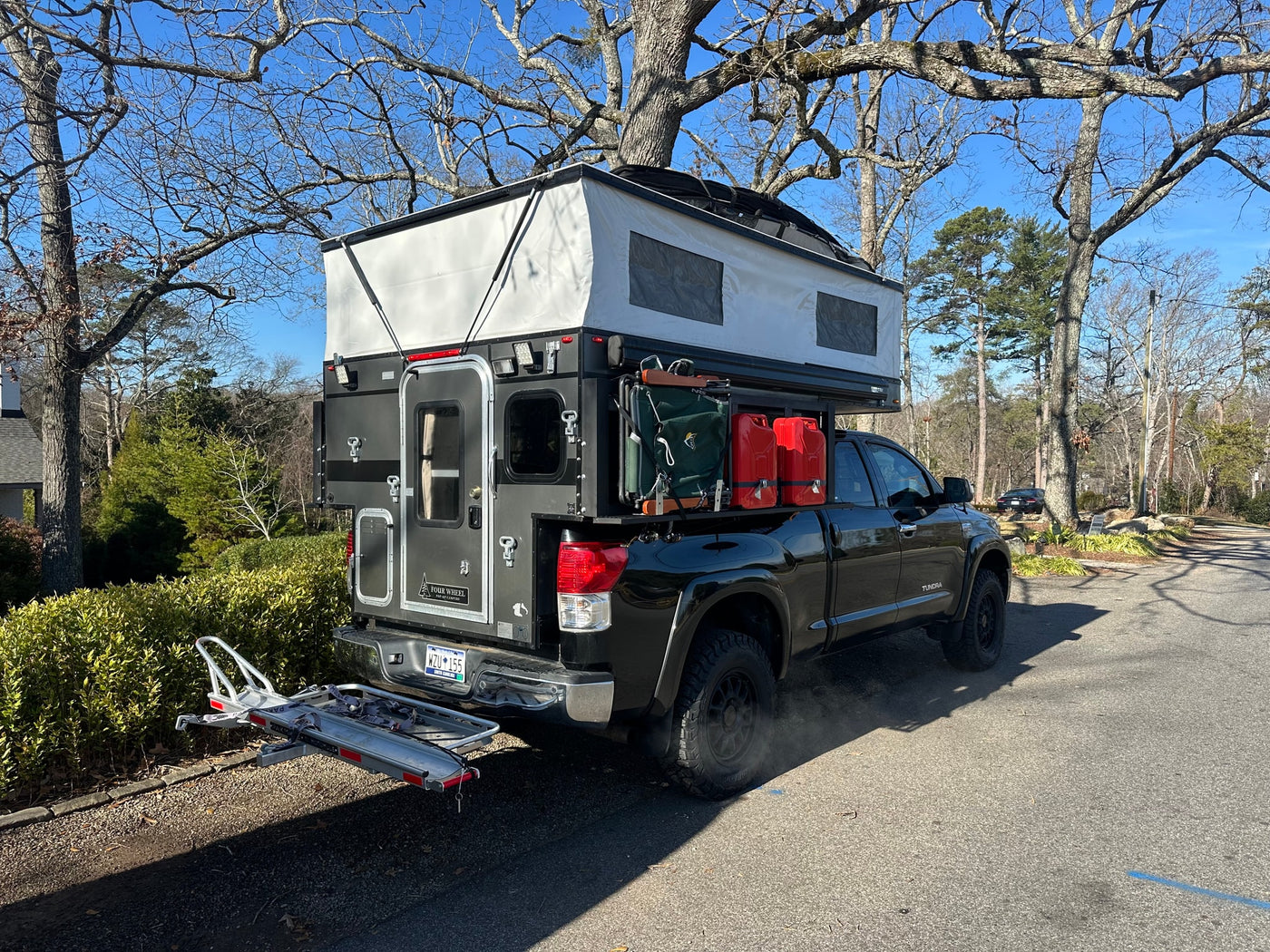  perfect for a rugged rv rental adventure.|Adventure-ready truck camper setup at a Shell station — photo 6