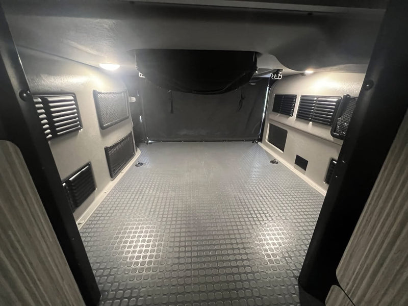  and portable toilet for efficient space utilization.|Compact kitchenette inside an rv rental — photo 14