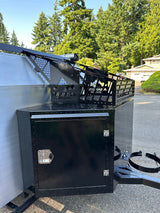 Rugged Mammoth Overland trailer, perfect for RV rental adventures. Features custom rack and large storage box.
