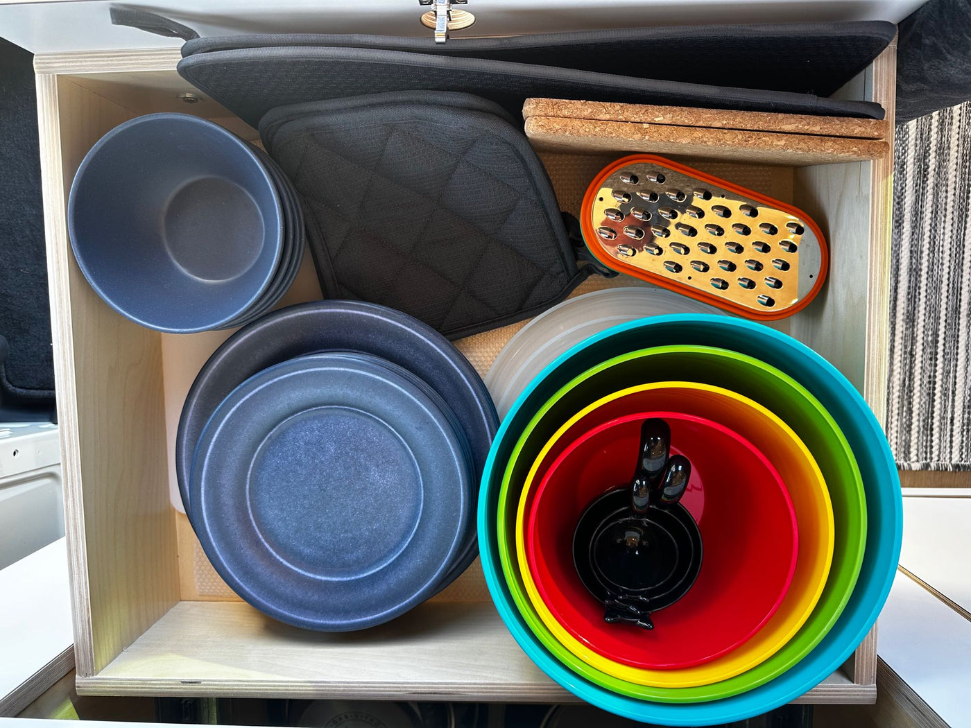  and rear windows.|Spacious RV rental interior featuring a full kitchen — photo 9