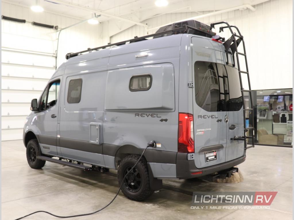 A sleek grey Winnebago Revel 4x4 Sprinter camper van, perfect for an rv rental adventure.