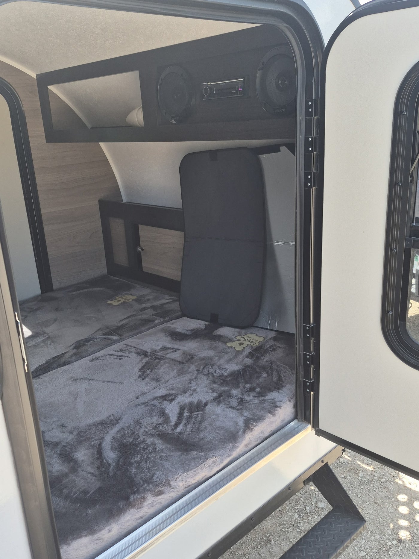  is ready for adventure.|Compact RV rental interior featuring a comfy bed — photo 5