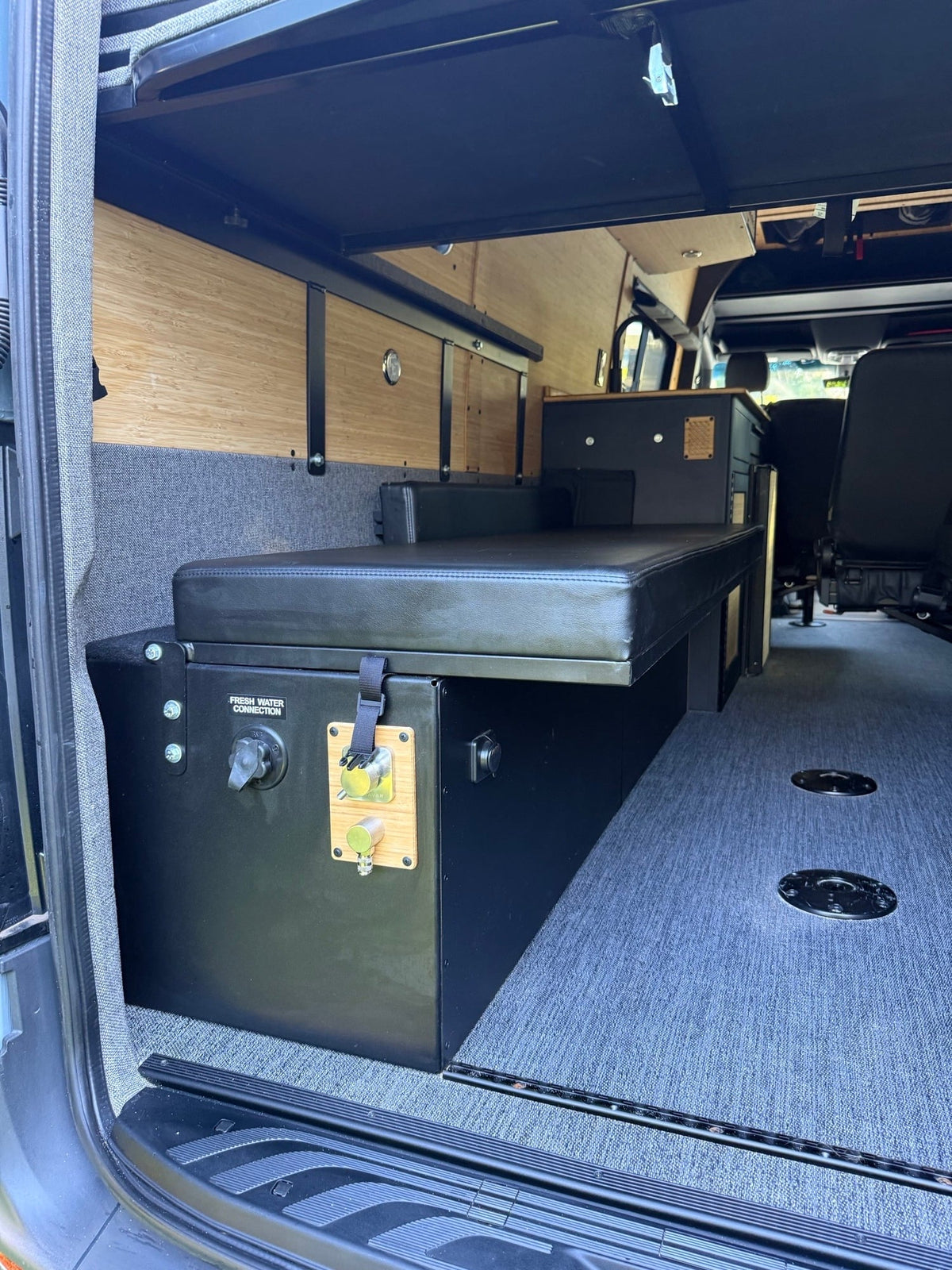  and comfy seating for travel.|RV rental interior: Bamboo walls — photo 18